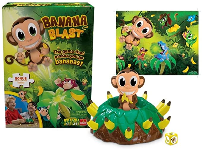 Game box, monkey puzzle and game setup with monkey sitting on a mound of bananas for the Banana Blast game