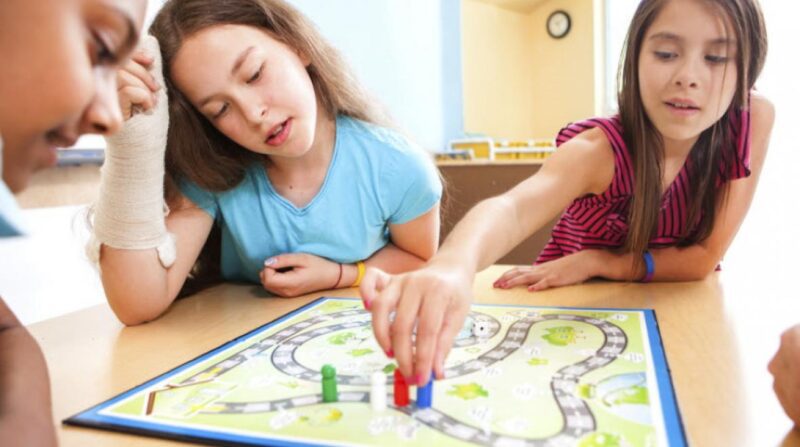 kids playing a board game