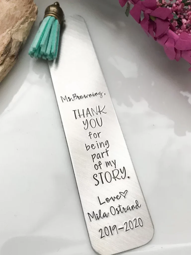 A silver bookmark says Thank you for being part of my story and is personalized with the teacher and student's names.