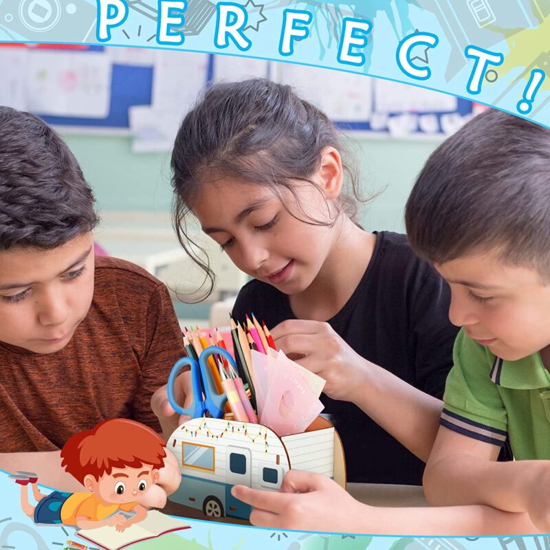 Three children huddle around a pencil holder made to look like a vintage camper.