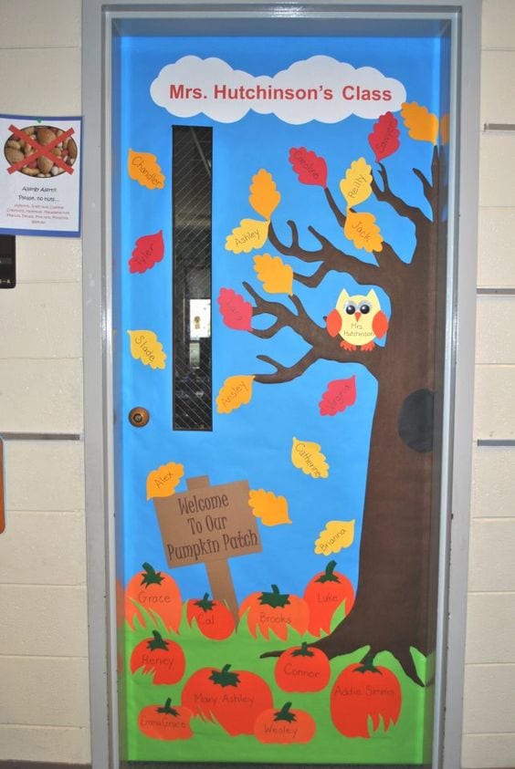 Door decoration of an owl on a tree over a pumpkin patch -- classroom doors