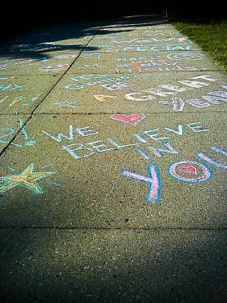 Chalk on sidewalk with positive messages