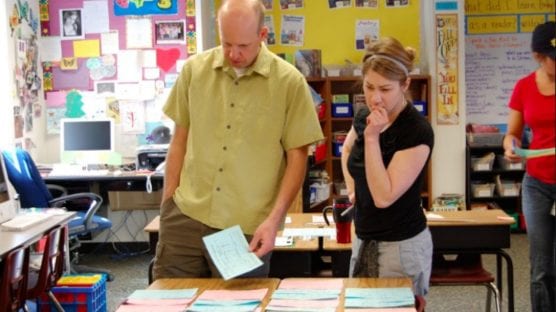 Teachers work in a team on creating balanced classrooms