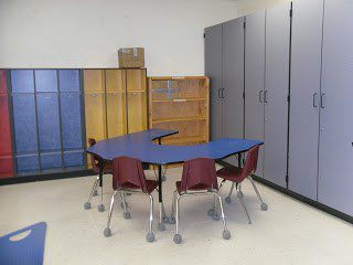 Classroom cabinets and chairs before photo