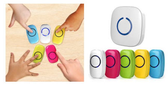 Four students using colorful classroom doorbell remotes to play a game