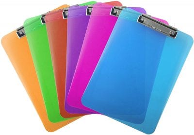 Stacked colorful clipboards -- 1st grade classroom supplies
