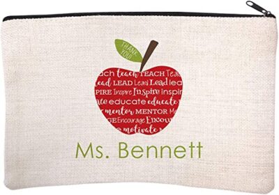 A small canvas makeup bag has an apple on it and says Ms. Bennett (personalized teacher gifts)