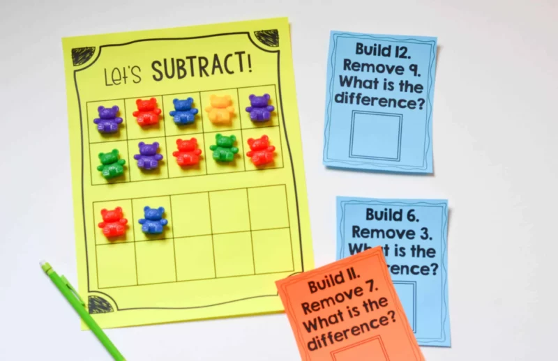 Math activity for young learners using problem cards, a tracking sheet, and plastic bears 