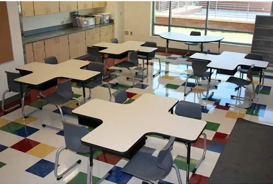 Four Dry Erase Collaboration Station Tables by Allied Plastics in classroom with chairs