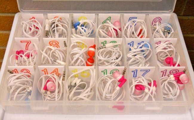 Compartmented plastic case holding numbered earbuds (Dollar Store Hacks)