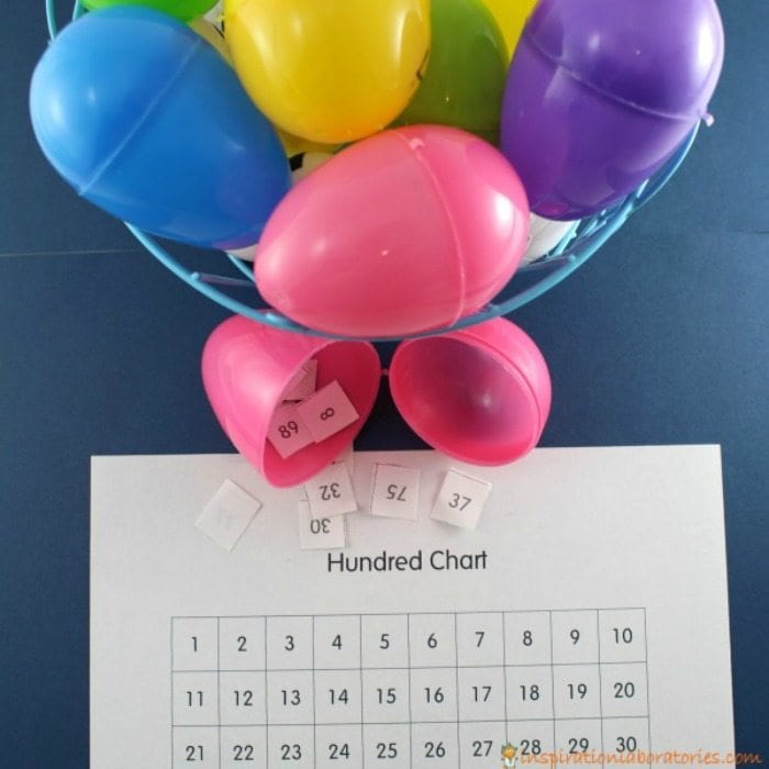 Plastic eggs filled with numbers and a printable hundreds chart