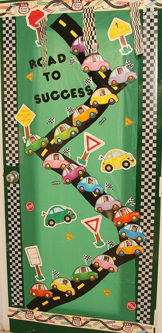 Door decoration of a road with cards saying "road to success"