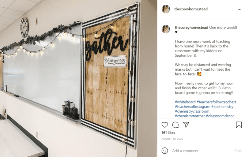 A bulletin board with faux wood paper sits at the end of a whiteboard and includes a cursive font "gather" sign at the top.