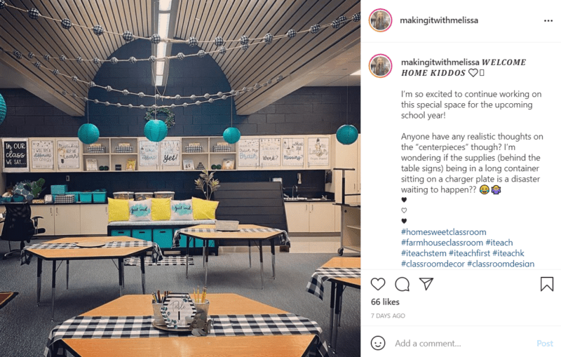 Tables in the foreground of this picture of farmhouse classroom décor with cabinets, shelving, and an arched ceiling decorated in black, white, yellow, and turquoise.