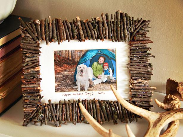 Rustic photo frame with photo and sticks, as an example of the best Father's Day crafts for kids