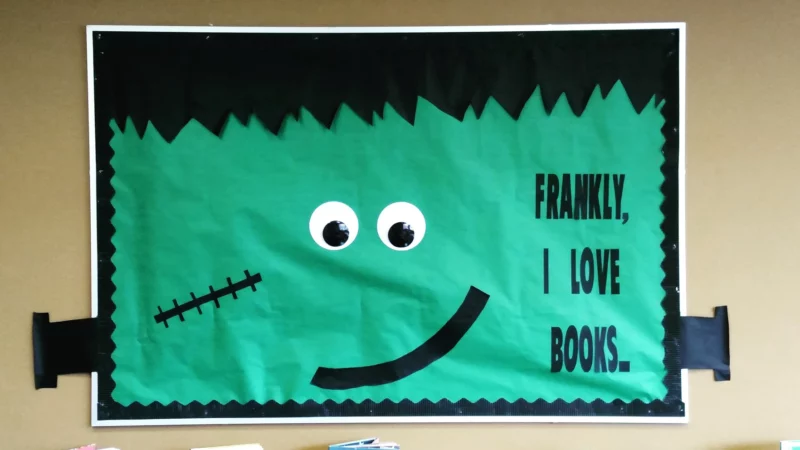 Fall bulletin boards: this one is all green and made to look like Frankenstein's head. Black text reads Frankly, I love books.