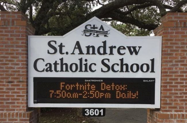 School marquee sign reading "Fortnite Detox: 7:50 am to 2:50 pm Daily!"