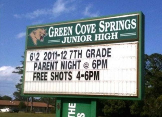 School marquee sign announcing parent night with free shots (Funny School Signs)