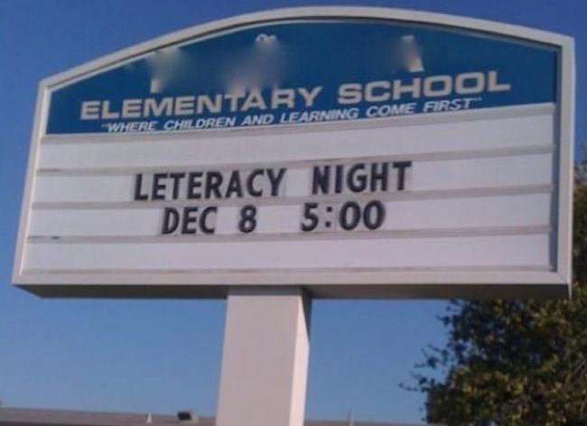 School marquee announcing a "Leteracy Night"