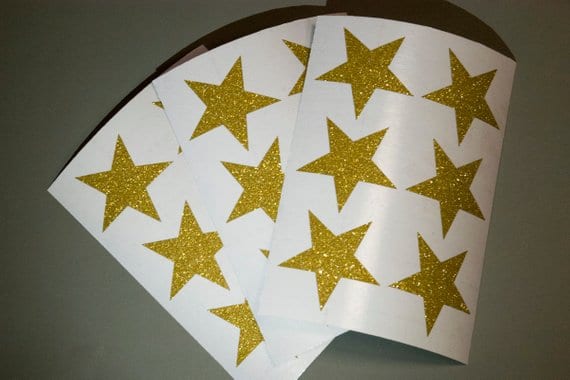 Sheet of gold star stickers.