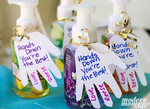 Hand sanitizer with hand cutouts on them