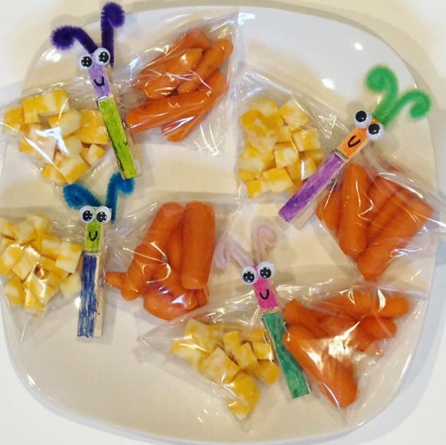 Cheese cubes and baby carrots in ziplock bags, with a clothespin body to turn it into a butterfly shape