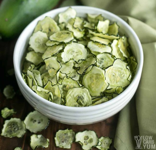 White bowl holding dehydrated cucumber chips (Healthy Snacks for Kids)