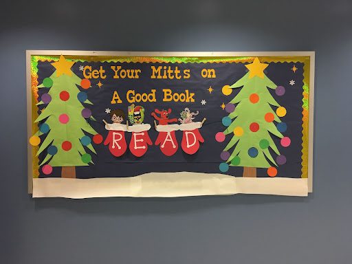 "Get your mitts on a good book"- december bulletin boards