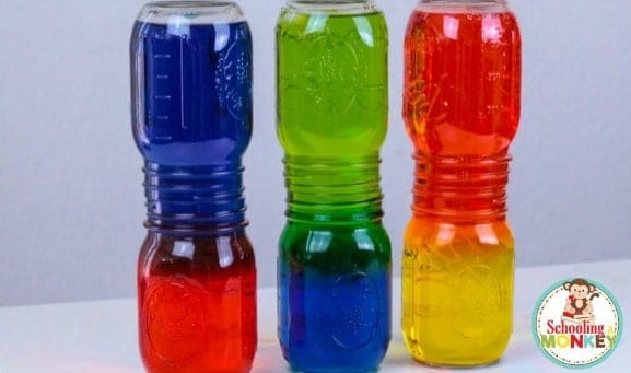 Jars of water with colorful layers of water