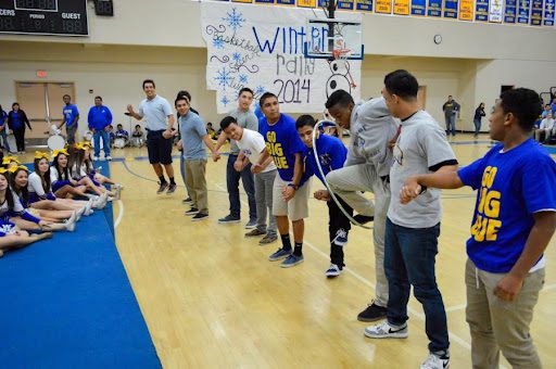 Students playing game in gymnasium