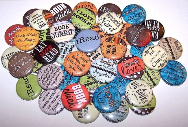 Assortment of pin-back buttons with reading slogans