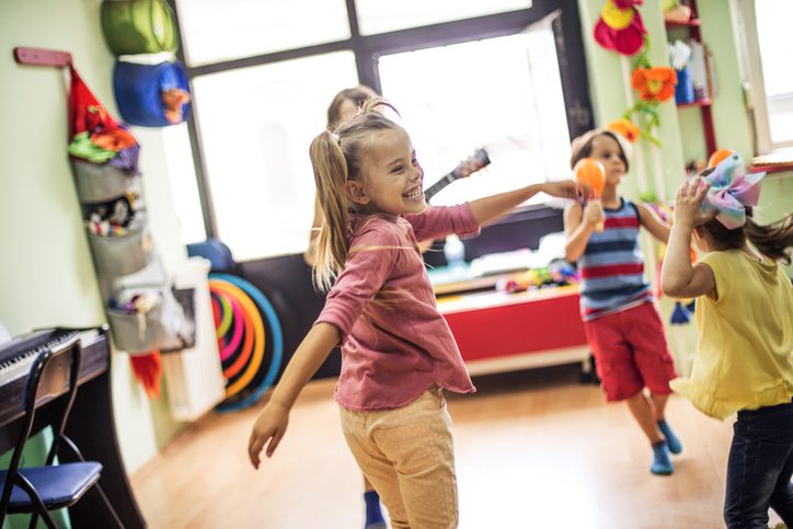 kids dancing in the classroom, as an example of indoor recess ideas