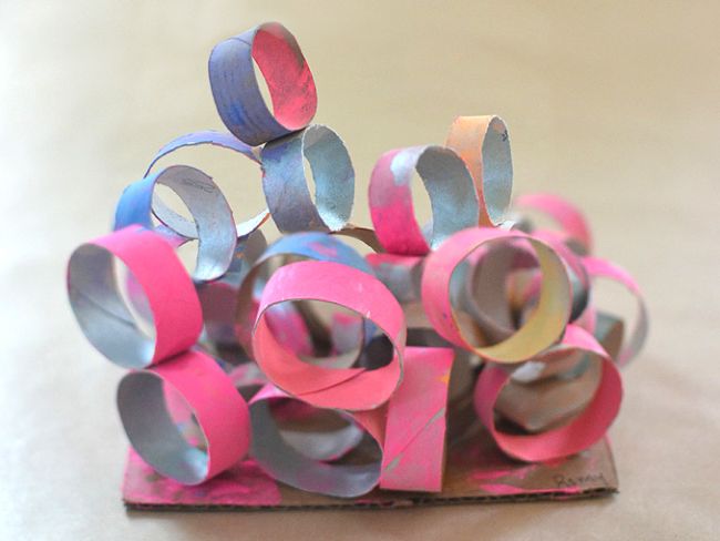 Sculpture made from pieces of cardboard tubes painted pink
