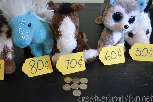 Stuffed animals labeled with price tags in increments of 10 cents (Kindergarten Math Games)