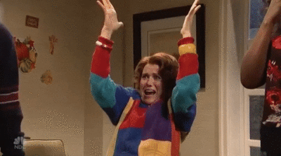 GIF of Kristen Wiig being excited