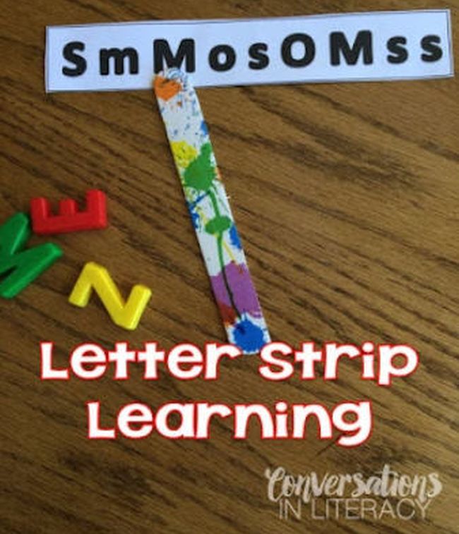 Paper strip with letters printed on it, with colorful stick pointing at one letter. Text reads Letter Strip Learning.