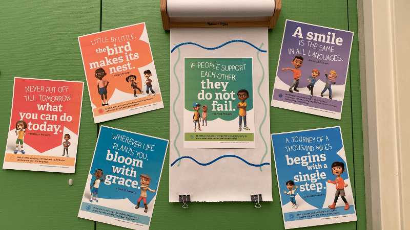 Inspirational quote posters on a classroom bulletin board