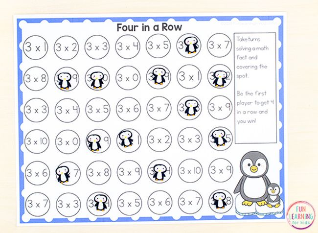 Printable Four in a Row game with math facts and a penguin theme