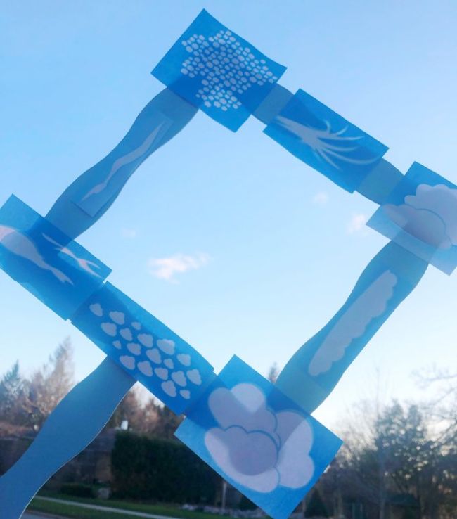 Frame made of wood craft sticks framing a cloud in the sky (Outdoor Science Activities)