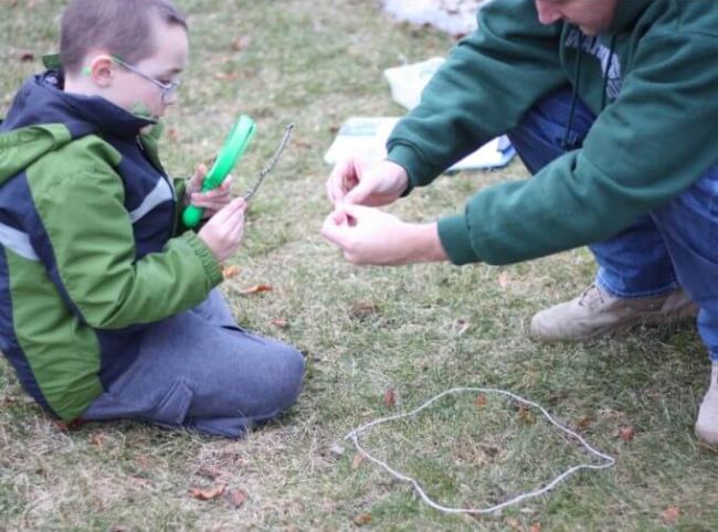 Kids examining the flora and fauna in one square foot of ground (Outdoor Science Activities)