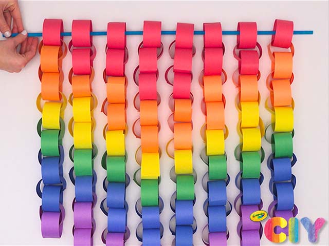 100th Day of school ideas: a dowel holding 8 colorful paper chains