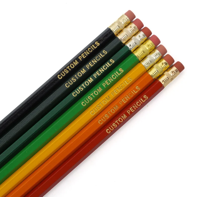 Several different colored pencils say Custom Pencils on them to show where engraving would go (personalized teacher gifts)