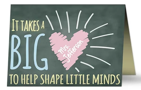 A black greeting card says "It takes a big heart to help shape little minds" there is a heart with a teacher's name in it (gifts for paraprofessionals)