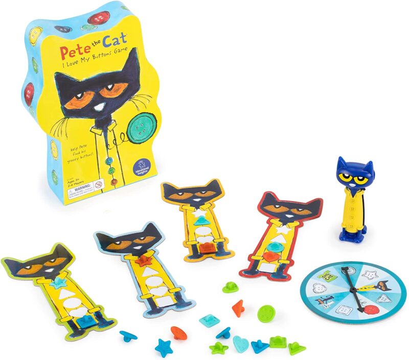 The book character Pete the Cat is on a box in the same shape as him. Several Pete the Cat game pieces are shown in addition to a spinner.