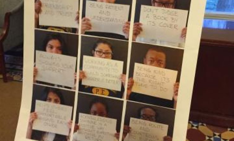 photographs of students holding up signs, as an example of SEL activities