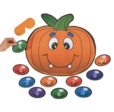 Pin the nose on the pumpkin game with smiling pumpkin