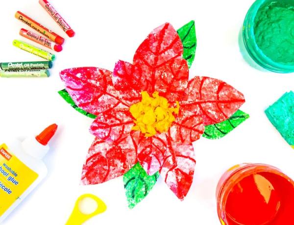 Pastel, yapıştırıcı ve makasla oluşturulmuş renkli Atatürk çiçeği