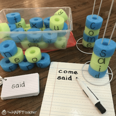 practice spelling words with pool noodle and paper towel holder