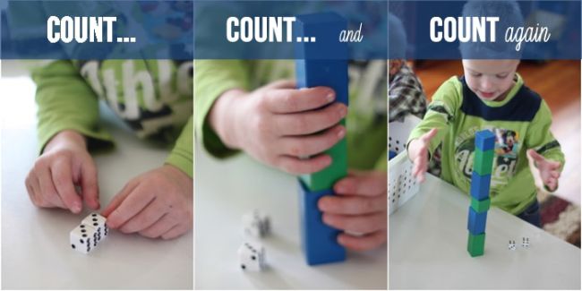 Preschooler using dice and blocks to practice counting