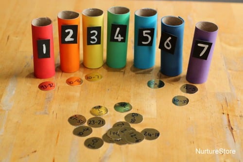 Rainbow classroom math activities with numbered colored tubes and math facts